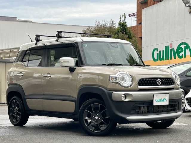 スズキ クロスビー HYBRID MZ 東京都 2020(令2)年 5.4万km キャラバンアイボリーパールメタリック/ホワイト 2トーンルーフ ワンオーナー/セーフティサポート(予防安全技術)/4WD/走行モード(スポーツ/スノー)/純正SDナビ(フルセグTV)/Bluetooth AM FM CD DVD/全方位モニター/クルーズコントロール/デュアルセンサーブレーキサポート/誤発進抑制機能/レーンアシスト/ふらつき警報機能/リアパーキングセンサー/LEDヘッドランプ/オートライト/スマートキー/スペアキー×1/保証書＆取扱説明書