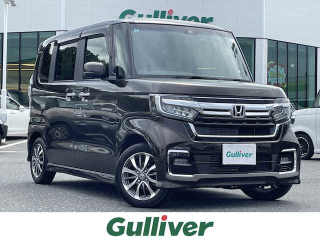 ホンダ Ｎ ＢＯＸ カスタム L 島根県 2022(令4)年 3.4万km プレミアムグラマラスブロンズP 登録時走行距離33719km/社外メモリナビ /・フルセグTV/・Bluetooth接続/・CD/DVD再生/・SDミュージックサーバー/・AM/FM/HondaSENSING/・衝突回避支援ブレーキ/・誤発進抑制機能/・車線維持支援システム/・アダプティブクルーズコントロール/・標識認識機能/バックカメラ/ETC/前後ドラブレコーダー/コーナーセンサー/ベンチシート/前席シートヒーター/チップアップシート/LEDヘッドライト/スマートキー/プッシュスタート