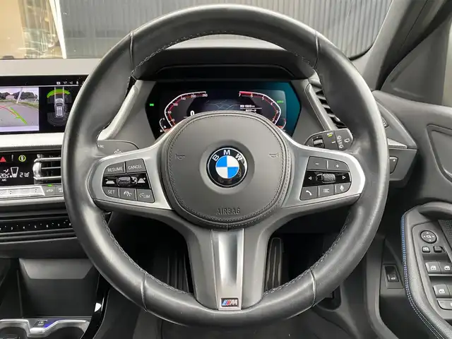 ＢＭＷ ＢＭＷ １１８ｉ Mスポーツ 福岡県 2021(令3)年 1.6万km アルピンホワイトⅢ インテリジェントセーフティ/アダプティブクルーズコントロール/ブラインドスポットモニター/レーンキープアシスト/純正ナビ　/Applecarplay/Bluetooth/バックカメラ/パワーバックドア/LEDライト/オートハイビーム/前後パーキングディスタンスコントロール/純正前後ドライブレコーダー/純正18インチアルミホイール/ミラー一体型ＥＴＣ/取扱説明書/保証書/スペアキー×1