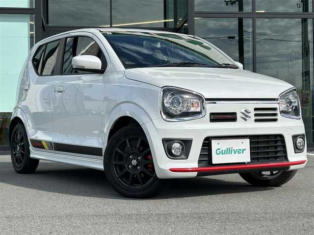 スズキ アルト ワークス 愛媛県 2019(令1)年 1.5万km ピュアホワイトP 社外7インチナビ（Bluetooth/フルセグTV/DVD再生）/前席純正レカロシート/ETC/純正エアロパーツ/パドルシフト/ステアリングスイッチ/社外フロアマット/純正アルミホイール/ウィンカーミラー/後方コーナーセンサー/フットイルミネーション/フォグランプ/スマートキー×2
