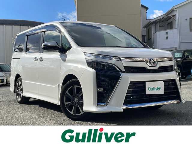 トヨタ ヴォクシー ZS 煌Ⅲ 大阪府 2021(令3)年 1.6万km ホワイトパールクリスタルシャイン ワンオーナー/ALPINE製9インチナビ/BTオーディオ/CD/DVD/フルセグテレビ/バックカメラ/両側パワースライドドア/ハーフレザーシート/革巻きステアリング/ステアリングスイッチ/トヨタセーフティセンス/LEDヘッドライト/純正16インチAW/純正フロアマット/純正ドアバイザー/ETC/スペアキー