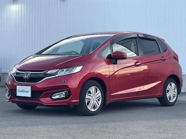 ホンダ フィット 13G L ホンダセンシング 愛媛県 2018(平30)年 5.2万km プレミアムクリスタルレッドM ホンダセンシング/アダプティブクルーズコントロール/純正7インチナビ【VXM-185VFi】/　CD/DVD/Bluetooth/フルセグ/バックカメラ/ビルトインETC/前方ドライブレコーダー/プッシュスタート/LEDヘッドライト/フロントフォグ/ステアリングスイッチ