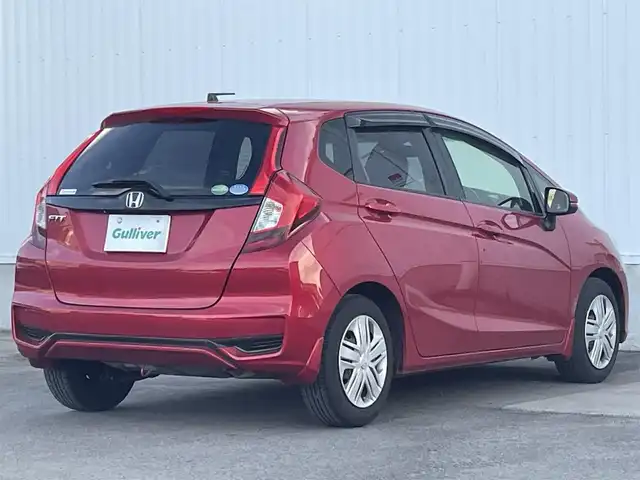 ホンダ フィット 13G L ホンダセンシング 愛媛県 2018(平30)年 5.2万km プレミアムクリスタルレッドM ホンダセンシング/アダプティブクルーズコントロール/純正7インチナビ【VXM-185VFi】/　CD/DVD/Bluetooth/フルセグ/バックカメラ/ビルトインETC/前方ドライブレコーダー/プッシュスタート/LEDヘッドライト/フロントフォグ/ステアリングスイッチ