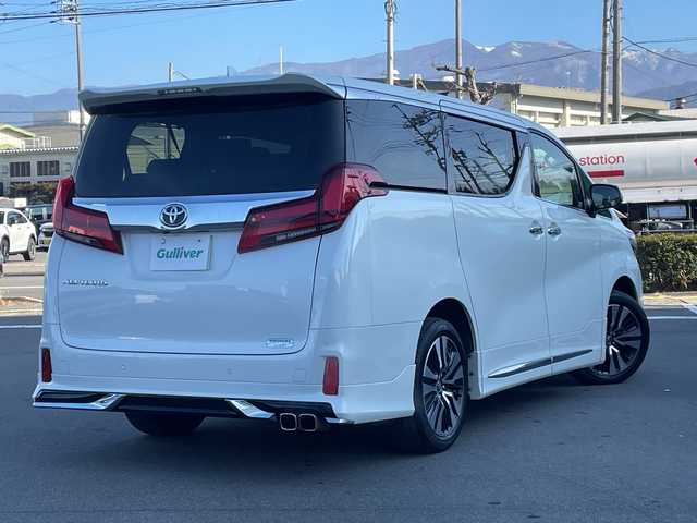 トヨタ アルファード S Cパッケージ 長野県 2022(令4)年 2.5万km ホワイトパールクリスタルシャイン 禁煙車/４WD/モデリスタエアロ（F・S・R）/9インチディスプレイオーディオ/（ナビ機能/CD・DVDデッキ/フルセグTV/Bluetooth）/純正１２インチフリップダウンモニター【V12-R68C】/セーフティセンス/・プリクラッシュセーフティ/・レーントレーシングアシスト/・アダプティブハイビームシステム/・レーダークルーズコントロール/・ロードサインアシスト/・インテリジェントクリアランスソナー/バックカメラ/ビルトインETC2.0/パワーバックドア/両側パワースライドドア/ブラック合皮シート/パワーシート（運転席メモリー機能付）/前席シートヒーター/前席ベンチレーション/ステアリングヒーター/ウッドコンビステアリング/ステアリングスイッチ/３眼LEDヘッドライト/フォグランプ/オートライト/スマートキー/Pスタート/電動格納ミラー/純正１８インチAW/純正フロアマット
