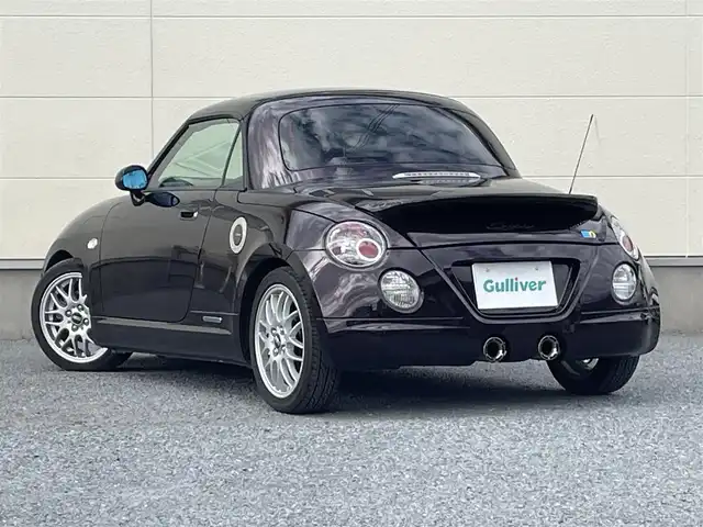 ダイハツ コペン ULTIMATE Ⅱ メモリアル 茨城県 2007(平19)年 8.4万km ダークレッドマイカ 100周年記念特別仕様車/社外メモリナビ/（フルセグＴＶ／Ｂｌｕｅｔｏｏｔｈ／ＤＶＤ／ＣＤ／ＦＭ／ＡＭ）/電動ルーフ/社外ＢＢＳアルミホイール/サクラムマフラーキット/レカロシート/MOMO製ステアリング/DSPORTカーボンタワーバー/ピボットマルチメーター（回転数・ブースト・水温）/シートヒーター/ETC/純正フロアマット/キーレス