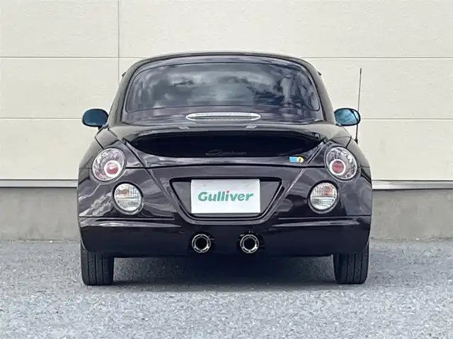 ダイハツ コペン ULTIMATE Ⅱ メモリアル 茨城県 2007(平19)年 8.4万km ダークレッドマイカ 100周年記念特別仕様車/社外メモリナビ/（フルセグＴＶ／Ｂｌｕｅｔｏｏｔｈ／ＤＶＤ／ＣＤ／ＦＭ／ＡＭ）/電動ルーフ/社外ＢＢＳアルミホイール/サクラムマフラーキット/レカロシート/MOMO製ステアリング/DSPORTカーボンタワーバー/ピボットマルチメーター（回転数・ブースト・水温）/シートヒーター/ETC/純正フロアマット/キーレス