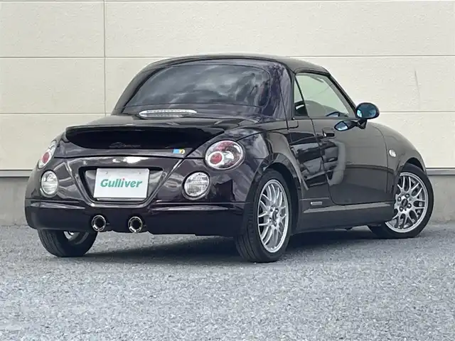 ダイハツ コペン ULTIMATE Ⅱ メモリアル 茨城県 2007(平19)年 8.4万km ダークレッドマイカ 100周年記念特別仕様車/社外メモリナビ/（フルセグＴＶ／Ｂｌｕｅｔｏｏｔｈ／ＤＶＤ／ＣＤ／ＦＭ／ＡＭ）/電動ルーフ/社外ＢＢＳアルミホイール/サクラムマフラーキット/レカロシート/MOMO製ステアリング/DSPORTカーボンタワーバー/ピボットマルチメーター（回転数・ブースト・水温）/シートヒーター/ETC/純正フロアマット/キーレス