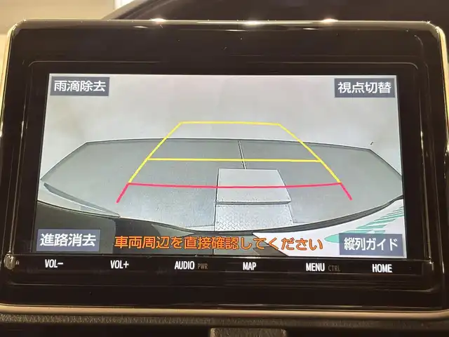 トヨタ エスクァイア ハイブリッド Gi プレミアムパッケージ 愛知県 2018(平30)年 3.4万km ブラック 純正9インチナビ（Bluetooth/フルセグTV/SD/AM/FM/CD/DVD）/純正12.1インチフリップダウンモニター/純正モデリスタフロントエアロ/トヨタセーフティセンス/被害軽減システム/両側パワースライドドア/ビルトインETC/LEDヘッドライト/シートヒーター/ステアリングヒーター/レーンキープアシスト/クルーズコントロール/バックカメラ/USB接続/プッシュスタート/スマートキー/スペアキー/純正フロアマット/純正15インチアルミホイール/ハーフレザーシート/ドアバイザー