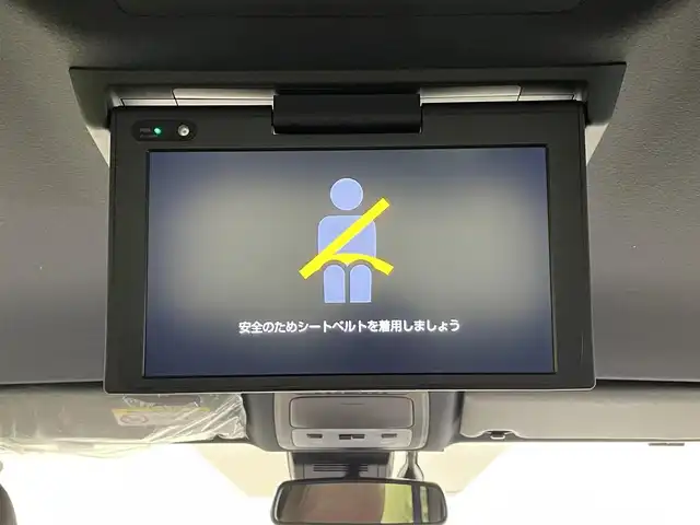 トヨタ エスクァイア ハイブリッド Gi プレミアムパッケージ 愛知県 2018(平30)年 3.4万km ブラック 純正9インチナビ（Bluetooth/フルセグTV/SD/AM/FM/CD/DVD）/純正12.1インチフリップダウンモニター/純正モデリスタフロントエアロ/トヨタセーフティセンス/被害軽減システム/両側パワースライドドア/ビルトインETC/LEDヘッドライト/シートヒーター/ステアリングヒーター/レーンキープアシスト/クルーズコントロール/バックカメラ/USB接続/プッシュスタート/スマートキー/スペアキー/純正フロアマット/純正15インチアルミホイール/ハーフレザーシート/ドアバイザー