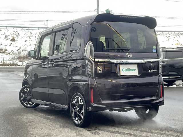 ホンダ Ｎ ＢＯＸ カスタム G L ターボ ホンダセンシング 青森県 2017(平29)年 7.8万km プレミアムベルベットパープル・パール ・4WD/・純正OPナビ/・バックカメラ/・フルセグ/CD/DVD/BT/・社外フリップダウンモニター/・両側パワースライドドア/・衝突軽減ブレーキ/・レーンキープアシスト/・追従型クルーズコントロール/・電子式パーキングブレーキ/・D＋N席シートヒーター/・オートマチックハイビーム/・パドルシフト/・純正ドライブレコーダー/・純正ETC/・社外AW冬タイヤ積込/・純正AW15インチ/・保証書・取説