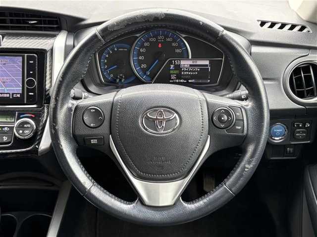 トヨタ カローラ フィールダー ハイブリッドG 埼玉県 2014(平26)年 11.7万km ブラックマイカ (株)IDOMが運営する【じしゃロン鳩ヶ谷店】の自社ローン専用車両になりますこちらは現金またはオートローンご利用時の価格です。自社ローンご希望の方は別途その旨お申付け下さい/登録時116140km/純正HDDナビ（NHZD-W62G）/　AM/FM/CD/DVD/MSV/BT/フルセグTV /バックカメラ/プッシュスタート/スマートキーx2/革巻きステアリング/ステアリングスイッチ/ビルトインETC/純正フルエアロ/純正15インチAW/革調シートカバー/ナノイー搭載エアコン/プラズマクラスター/フォグランプ/ルーフレール/電動格納機能付きメッキウインカーミラー/オールオートパワーウィンドウ/ドアバイザー/フロアマット/ISOFIX/保証書/取扱説明書