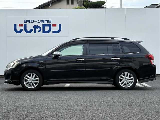 トヨタ カローラ フィールダー ハイブリッドG 埼玉県 2014(平26)年 11.7万km ブラックマイカ (株)IDOMが運営する【じしゃロン鳩ヶ谷店】の自社ローン専用車両になりますこちらは現金またはオートローンご利用時の価格です。自社ローンご希望の方は別途その旨お申付け下さい/登録時116140km/純正HDDナビ（NHZD-W62G）/　AM/FM/CD/DVD/MSV/BT/フルセグTV /バックカメラ/プッシュスタート/スマートキーx2/革巻きステアリング/ステアリングスイッチ/ビルトインETC/純正フルエアロ/純正15インチAW/革調シートカバー/ナノイー搭載エアコン/プラズマクラスター/フォグランプ/ルーフレール/電動格納機能付きメッキウインカーミラー/オールオートパワーウィンドウ/ドアバイザー/フロアマット/ISOFIX/保証書/取扱説明書