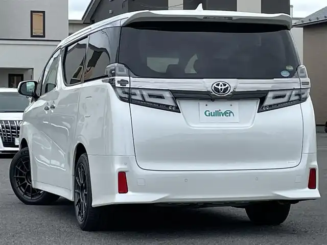 トヨタ ヴェルファイア ZG 道央・札幌 2018(平30)年 8.9万km ホワイトパールクリスタルシャイン ４WD/寒冷地仕様/純正ディーラーOPナビ/トヨタセーフティセンス/プリクラッシュセーフティ/横滑り防止装置/レーダークルーズコントロール/レーンキープアシスト/クリアランスソナー/バックカメラ/ビルトインETC2.0/ドライブレコーダー/アイドリングストップ/両側パワースライドドア/パワーバックドア/前席/２列目パワーシート/D席メモリーシート/前席シートヒーター/前席エアシート/N席/２列目オットマン/レザーシート/ステアリングリモコン/ハンドルヒーター/デジタルインナーミラー/電動パーキング/ブレーキホールド/プッシュスタート/スマートキー/LEDヘッドライト/オートライト/オートハイビーム/フォグランプ/電動格納ミラー/ウィンカーミラー/純正フロアマット/スペアキー/純正AW付冬タイヤ積込/235/50/R18/2022年/山8mm