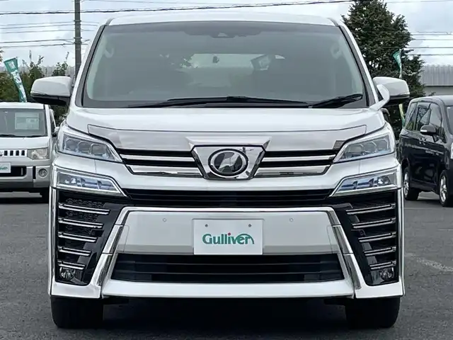 トヨタ ヴェルファイア ZG 道央・札幌 2018(平30)年 8.9万km ホワイトパールクリスタルシャイン ４WD/寒冷地仕様/純正ディーラーOPナビ/トヨタセーフティセンス/プリクラッシュセーフティ/横滑り防止装置/レーダークルーズコントロール/レーンキープアシスト/クリアランスソナー/バックカメラ/ビルトインETC2.0/ドライブレコーダー/アイドリングストップ/両側パワースライドドア/パワーバックドア/前席/２列目パワーシート/D席メモリーシート/前席シートヒーター/前席エアシート/N席/２列目オットマン/レザーシート/ステアリングリモコン/ハンドルヒーター/デジタルインナーミラー/電動パーキング/ブレーキホールド/プッシュスタート/スマートキー/LEDヘッドライト/オートライト/オートハイビーム/フォグランプ/電動格納ミラー/ウィンカーミラー/純正フロアマット/スペアキー/純正AW付冬タイヤ積込/235/50/R18/2022年/山8mm