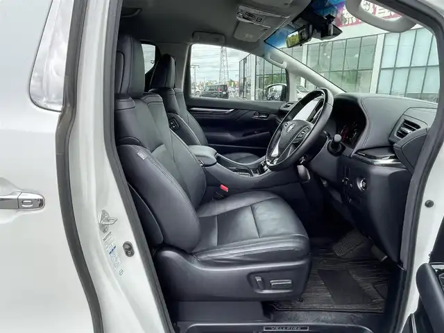 トヨタ ヴェルファイア ZG 道央・札幌 2018(平30)年 8.9万km ホワイトパールクリスタルシャイン ４WD/寒冷地仕様/純正ディーラーOPナビ/トヨタセーフティセンス/プリクラッシュセーフティ/横滑り防止装置/レーダークルーズコントロール/レーンキープアシスト/クリアランスソナー/バックカメラ/ビルトインETC2.0/ドライブレコーダー/アイドリングストップ/両側パワースライドドア/パワーバックドア/前席/２列目パワーシート/D席メモリーシート/前席シートヒーター/前席エアシート/N席/２列目オットマン/レザーシート/ステアリングリモコン/ハンドルヒーター/デジタルインナーミラー/電動パーキング/ブレーキホールド/プッシュスタート/スマートキー/LEDヘッドライト/オートライト/オートハイビーム/フォグランプ/電動格納ミラー/ウィンカーミラー/純正フロアマット/スペアキー/純正AW付冬タイヤ積込/235/50/R18/2022年/山8mm