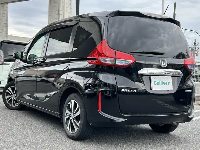 ホンダ フリード ハイブリット EX 奈良県 2018(平30)年 3.5万km プレミアムスパークルブラックパール 1オーナー/社外ナビ(CN-RE04D)/BT/TV/SD//ALPINE後席モニター/両側パワスラ/衝突軽減システム/レーンキープアシスト/追従式レーダークルコン/横滑り防止装置/バックカメラ/ETC/ドラレコ/ハーフレザー/シートヒーター/三列シート/社外フロアマット/カーテンエアバック/保証書・取説・スペアキー付