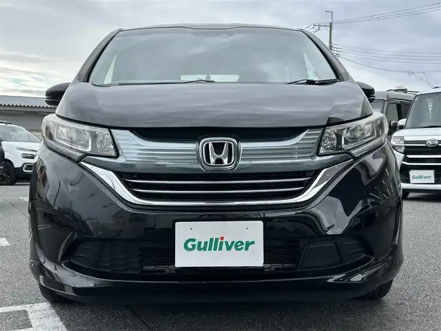 ホンダ フリード ハイブリット EX 奈良県 2018(平30)年 3.5万km プレミアムスパークルブラックパール 1オーナー/社外ナビ(CN-RE04D)/BT/TV/SD//ALPINE後席モニター/両側パワスラ/衝突軽減システム/レーンキープアシスト/追従式レーダークルコン/横滑り防止装置/バックカメラ/ETC/ドラレコ/ハーフレザー/シートヒーター/三列シート/社外フロアマット/カーテンエアバック/保証書・取説・スペアキー付