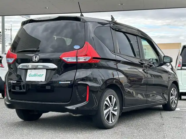 ホンダ フリード ハイブリット EX 奈良県 2018(平30)年 3.5万km プレミアムスパークルブラックパール 1オーナー/社外ナビ(CN-RE04D)/BT/TV/SD//ALPINE後席モニター/両側パワスラ/衝突軽減システム/レーンキープアシスト/追従式レーダークルコン/横滑り防止装置/バックカメラ/ETC/ドラレコ/ハーフレザー/シートヒーター/三列シート/社外フロアマット/カーテンエアバック/保証書・取説・スペアキー付