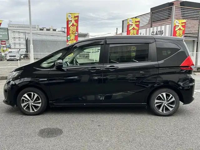 ホンダ フリード ハイブリット EX 奈良県 2018(平30)年 3.5万km プレミアムスパークルブラックパール 1オーナー/社外ナビ(CN-RE04D)/BT/TV/SD//ALPINE後席モニター/両側パワスラ/衝突軽減システム/レーンキープアシスト/追従式レーダークルコン/横滑り防止装置/バックカメラ/ETC/ドラレコ/ハーフレザー/シートヒーター/三列シート/社外フロアマット/カーテンエアバック/保証書・取説・スペアキー付
