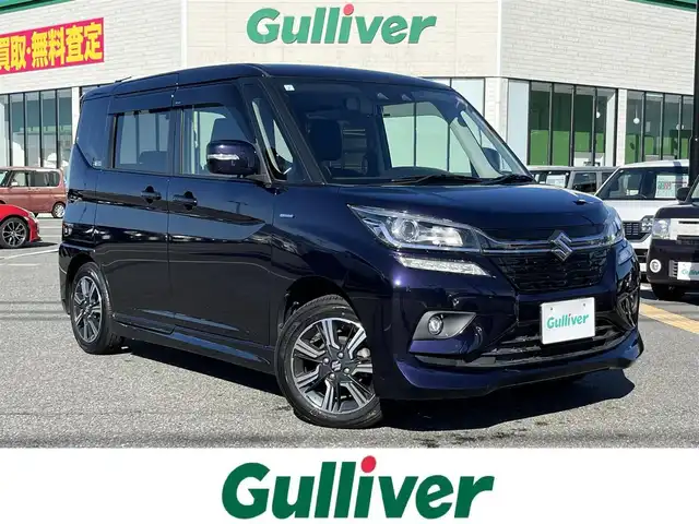 スズキ ソリオ バンディット HV MV 鳥取県 2019(平31)年 6.7万km ミッドナイトバイオレットメタリック 純正8インチナビ/フルセグ/DVD/CD/BT/USB/バックカメラ・ETC/前後ドライブレコーダー/運転席シートヒーター/デュアルカメラブレーキサポート/レーダークルーズコントロール/レーンキープアシスト/LEDヘットライト/純正15インチアルミホイール/片側パワースライドドア/プッシュエンジンスタート/アイドリングストップ/フロアマット/ドアバイザー/保証書・取扱説明書/スペアキー