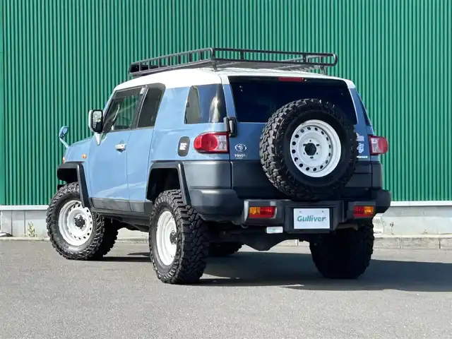 トヨタ ＦＪクルーザー カラーパッケージ 宮城県 2014(平26)年 6.6万km ホワイト/スモーキーブルー JAOS BATTLEZリフトアップ　/BajaRack製ルーフラック/社外メモリナビ（AVIC-RZ801）/・CD/DVD/・Bluetooth/・フルセグTV/バックカメラ/リアパーキングセンサー/革巻きステアリング/クルーズコントロール/HIDヘッドランプ/リモコンキー/スペアキー1本/フロアマット/ドアバイザー/W/サイド/カーテンエアバッグ