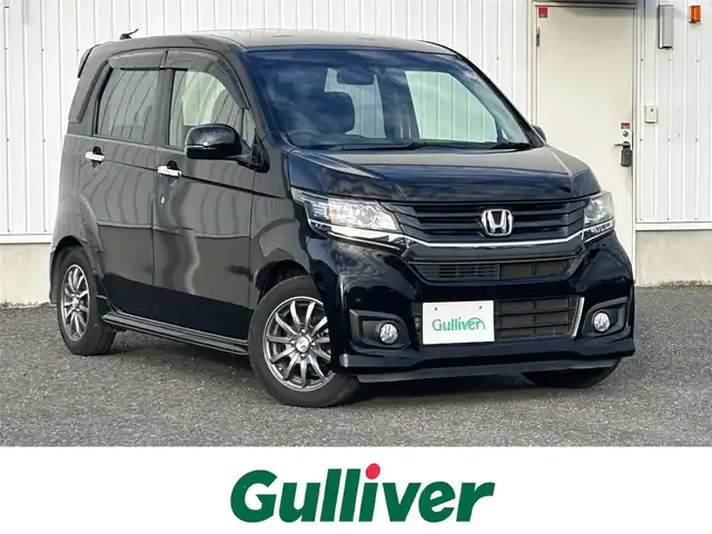 ホンダ Ｎ ＷＧＮ カスタム G ターボパッケージ 熊本県 2014(平26)年 7万km プレミアムゴールドパープルパール 純正ナビ/・AM/FM/CD/DVD/BT/SD/・ワンセグTV/バックカメラ/ETC/衝突軽減ブレーキ/横滑り防止装置/革巻きステアリング/ステアリングスイッチ/パドルシフト/フォグランプ/オートライト/ドライブレコーダー/クルーズコントロール/純正フロアマット/純正アルミホイール/電動格納ミラー/ウインカーミラー/ドアバイザー/スペアキー