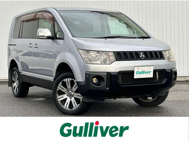 三菱 デリカＤ：５ シャモニー 滋賀県 2010(平22)年 14.9万km クールシルバー/ミディアムグレーマイカ 純正HDDナビ/・AM/FM/・CD/DVD/・Bluetooth/・フルセグTV/バックカメラ/サイドカメラ/パドルシフト/フリップダウンモニター/ビルトインETC/運転席パワーシート/前席シートヒーター/クルーズコントロール/片側パワースライドドア/コーナーセンサー/ウッドコンビステアリング/リフトアップ/社外マフラー/オートマチックヘッドライト/HIDヘッドライト/フォグランプ/純正18インチアルミホイール