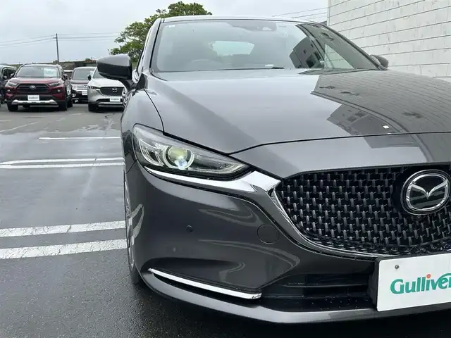 マツダ アテンザ セダン XD Lパッケージ 静岡県 2019(令1)年 5.8万km マシーングレープレミアムM i-ACTIVSENSE/純正SDナビ/　FM AM CD DVD Bluetooth AUX/フルセグTV/ETC/前後ドライブレコーダー/LEDオートヘッドライト/レーダークルーズコントロール/パワーシート(前席)/全席シートヒーター/シートベンチレーション/ヘッドアップディスプレイ/純正19インチアルミホイール/リアサンシェード/ワンオーナー/BOSEプレミアムサウンド/ブラウンレザーシート/アラウンドビューモニター
