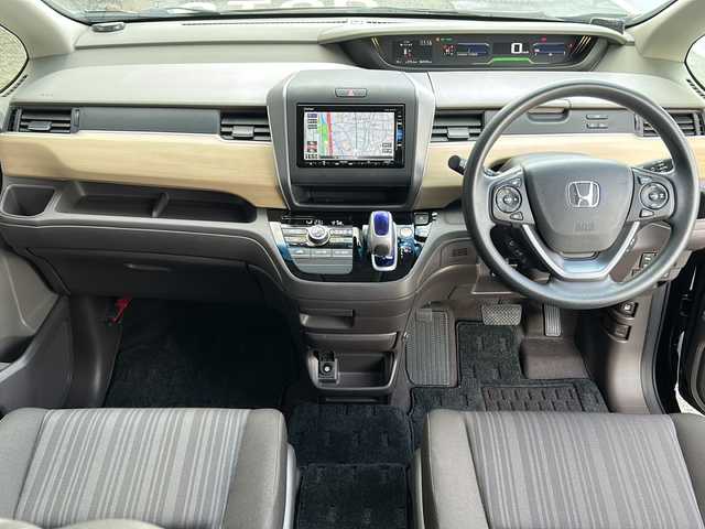 ホンダ フリード ハイブリット G ホンダセンシング 広島県 2019(令1)年 6.9万km プレミアムスパークルブラックパール 禁煙/純正ナビ/CD/DVD/DTV/Bluetooth/バックカメラ/両側パワースライドドア/レーダークルーズコントロール/LEDオートライト/スマートキー/スペアキー/プッシュスタート/ビルトインETC/ドライブレコーダー/ステアリングスイッチ/コーナーセンサー/純正フロアマット/ドアバイザー