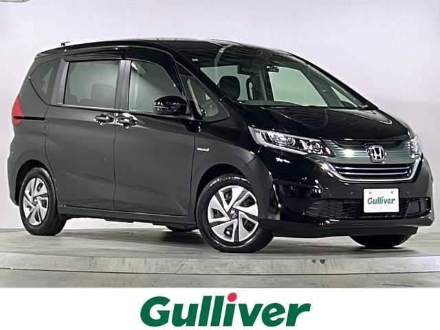 ホンダ フリード ハイブリット G ホンダセンシング 広島県 2019(令1)年 6.9万km プレミアムスパークルブラックパール 禁煙/純正ナビ/CD/DVD/DTV/Bluetooth/バックカメラ/両側パワースライドドア/レーダークルーズコントロール/LEDオートライト/スマートキー/スペアキー/プッシュスタート/ビルトインETC/ドライブレコーダー/ステアリングスイッチ/コーナーセンサー/純正フロアマット/ドアバイザー