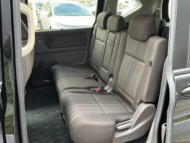 ホンダ フリード ハイブリット G ホンダセンシング 広島県 2019(令1)年 6.9万km プレミアムスパークルブラックパール 禁煙/純正ナビ/CD/DVD/DTV/Bluetooth/バックカメラ/両側パワースライドドア/レーダークルーズコントロール/LEDオートライト/スマートキー/スペアキー/プッシュスタート/ビルトインETC/ドライブレコーダー/ステアリングスイッチ/コーナーセンサー/純正フロアマット/ドアバイザー