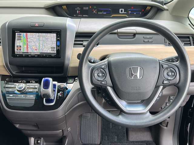 ホンダ フリード ハイブリット G ホンダセンシング 広島県 2019(令1)年 6.9万km プレミアムスパークルブラックパール 禁煙/純正ナビ/CD/DVD/DTV/Bluetooth/バックカメラ/両側パワースライドドア/レーダークルーズコントロール/LEDオートライト/スマートキー/スペアキー/プッシュスタート/ビルトインETC/ドライブレコーダー/ステアリングスイッチ/コーナーセンサー/純正フロアマット/ドアバイザー