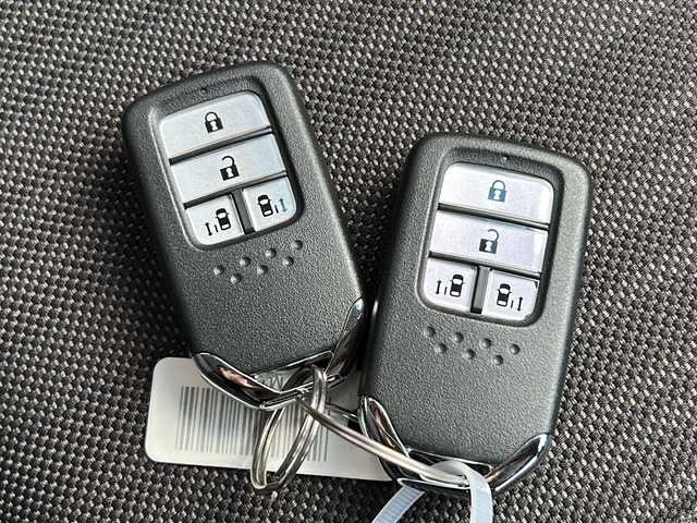 ホンダ フリード ハイブリット G ホンダセンシング 広島県 2019(令1)年 6.9万km プレミアムスパークルブラックパール 禁煙/純正ナビ/CD/DVD/DTV/Bluetooth/バックカメラ/両側パワースライドドア/レーダークルーズコントロール/LEDオートライト/スマートキー/スペアキー/プッシュスタート/ビルトインETC/ドライブレコーダー/ステアリングスイッチ/コーナーセンサー/純正フロアマット/ドアバイザー