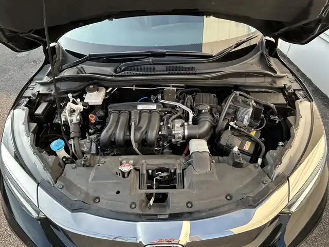 ホンダ ヴェゼル ハイブリッド Z ホンダセンシング 佐賀県 2021(令3)年 9.1万km クリスタルブラックパール ホンダセンシング/レーダークルーズコントロール/純正8インチSDナビ/・バックカメラ/・フルセグTV/BT/CD/DVD/前後ドライブレコーダー/ETC/ハーフレザーシート/前席シートヒーター/純正17インチAW/LEDヘッドライト/オートライト/フォグランプ/革巻きステアリング/パドルシフト/電動パーキングスイッチ/スペアキー×１/取扱説明書/保証書