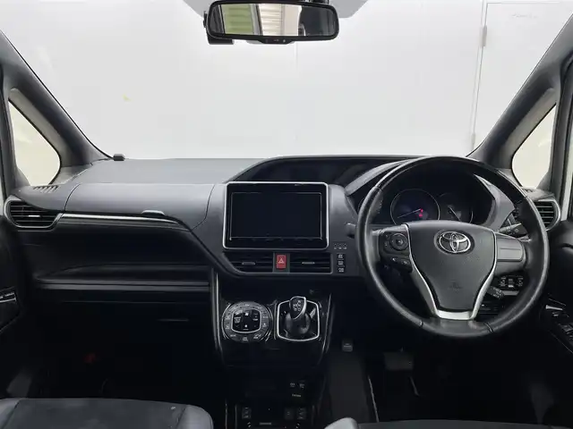 トヨタ エスクァイア ハイブリッド Gi プレミアムパッケージ ブラックテーラード 茨城県 2019(令1)年 5.4万km ホワイトパールクリスタルシャイン 純正9型ナビ/バックカメラ/フルセグ/TRDエアロ/TRDフロントグリル/AC100V/衝突被害軽減ブレーキ/車線逸脱抑制装置/クルーズコントロール/オートマチックハイビーム/クリアランスソナー/両側電動スライドドア/ETC2.0/シートヒーター/社外15インチAW/LEDヘッドライト/スマートキー