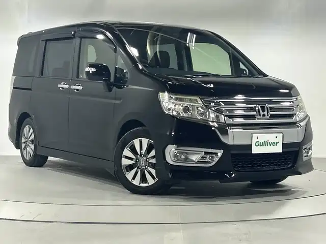 ホンダ ステップワゴン スパーダ Z 神奈川県 2013(平25)年 9万km プレミアムスパークルブラックパール 純正9インチナビ/バックカメラ/ビルトインETC/ステアリングリモコン/パドルシフト/オートエアコン/両側パワースライドドア/純正HIDヘッドライト/フォグランプ/純正16インチアルミホイール/横滑り防止機能/ヒルスタートアシスト/電動格納ウィンカーミラー/ドアバイザー