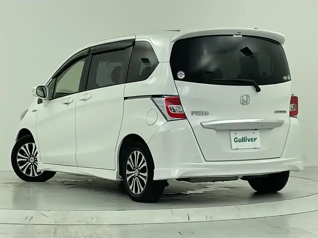 ホンダ フリード ハイブリット ジャストセレクション 大阪府 2014(平26)年 5.6万km ホワイトオーキッドパール ナビ装着用スペシャルパッケージ/純正OPナビ/フルセグTV/BT/CD/DVD/バックカメラ/ETC/両側パワースライドドア/クルーズコントロール/ステアリングスイッチ/革巻ステアリング/横滑り防止装置/オートライト/純正15インチAW/純正フロアマット/純正ドアバイザー