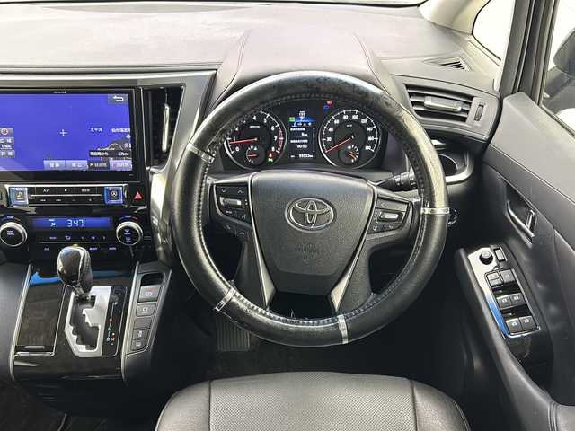 トヨタ ヴェルファイア Z 宮城県 2015(平27)年 6万km ブラック アルパイン10インチナビ/12.8インチフリップダウンモニター/両側パワースライドドア/RS-Rダウンサス(純正部品車載)/バックカメラ/ビルトインETC/プッシュスタート/スマートキー/オートライト/LEDヘッドライト/フォグランプ/ドアバイザー/純正フロアマット/レザー調シートカバー/純正18インチアルミホイール