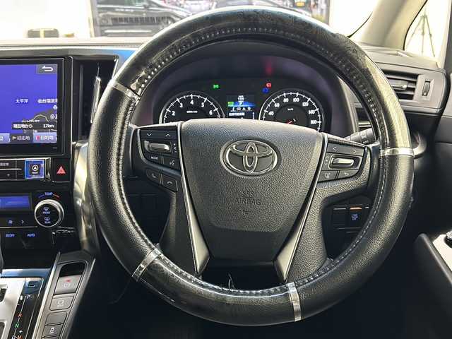 トヨタ ヴェルファイア Z 宮城県 2015(平27)年 6万km ブラック アルパイン10インチナビ/12.8インチフリップダウンモニター/両側パワースライドドア/RS-Rダウンサス(純正部品車載)/バックカメラ/ビルトインETC/プッシュスタート/スマートキー/オートライト/LEDヘッドライト/フォグランプ/ドアバイザー/純正フロアマット/レザー調シートカバー/純正18インチアルミホイール