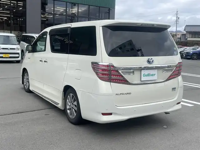 トヨタ アルファードハイブリット X 長野県 2012(平24)年 10.9万km ゴールドパールクリスタルシャイン ALPINEナビ/ALPINEフリップダウンモニター/ＣＤ・ＤＶＤ再生/Bluetooth Audio/バックカメラ/両側パワースライドドア/スマートキー/プッシュスタート/HIDライト/オートライト/革調シートカバー/前後ドライブレコーダー/ETC/コーナーセンサー/クルーズコントロール
