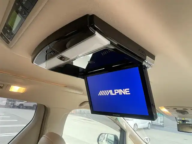 トヨタ アルファードハイブリット X 長野県 2012(平24)年 10.9万km ゴールドパールクリスタルシャイン ALPINEナビ/ALPINEフリップダウンモニター/ＣＤ・ＤＶＤ再生/Bluetooth Audio/バックカメラ/両側パワースライドドア/スマートキー/プッシュスタート/HIDライト/オートライト/革調シートカバー/前後ドライブレコーダー/ETC/コーナーセンサー/クルーズコントロール