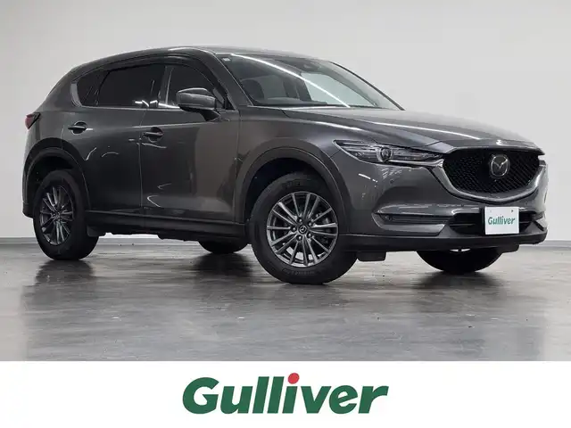 マツダ ＣＸ－５ XD Lパッケージ 三重県 2018(平30)年 6.6万km マシーングレープレミアムM ディーゼル・ターボ/FF/MTモード付フロア6AT/純正 8インチナビ/（FM/AM/aha/Stitcher/Bluetooth/USB/CD*/AUX/DVD*/TV*）/360°ビュー・モニター*/BOSEサウンドシステム*/ドライブレコーダー 前方/ETC/安全/●車間認知支援システム/●スマートブレーキサポート/●スマートシティブレーキサポート/●車線逸脱警報/●レーンキープアシストシステム/●レーダークルーズコントロール/●BSMシステム（RCTA機能付）/●交通標識認識システム/●ドライバーアテンションアラート/●パーキングセンサーシステム 前後*/装備/・本革シート（黒）/・パワーシート（D10way/N6way）/・シートヒーター（D/N/2nd左右）/・ステアリングヒーター/・パワーテールゲート/・アクティブドライビングディスプレイ（HUD）/・左右独立オートエアコン/・オートライト/・LEDヘッドランプ/・ハイビームコントロールシステム（HBC）/・レインセンサーワイパー/・電子パーキングブレーキ＆オートホールド/・ステアリングスイッチ/・プッシュスタート/・純正17inAW/・スマートキーx2/・保/取/ナビ取/など/*…メーカーOP