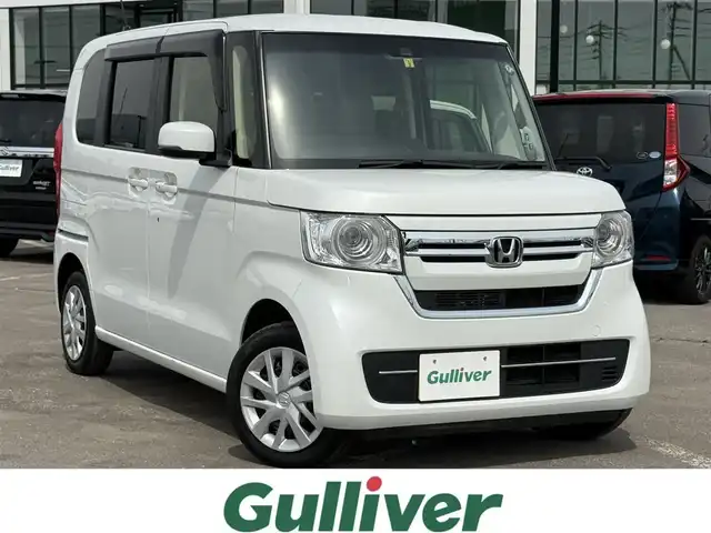 ホンダ Ｎ ＢＯＸ L 道南・函館 2023(令5)年 1.1万km プラチナホワイトパール ・ワンオーナー/・純正ナビ/・バックカメラ/・片側パワースライドドア/・純正エンジンスターター/・CMBS/・アダプティブクルーズコントロール/・先行車発進お知らせ/・路外逸脱抑制システム/・レーンキープアシスト/・オートマチックハイビーム/・パーキングセンサー/・前席シートヒーター/・LEDヘッドライト/・オートライト/・プッシュスタート/・スマートキー/・ミラーヒーター/・夏タイヤ14インチホイール積込