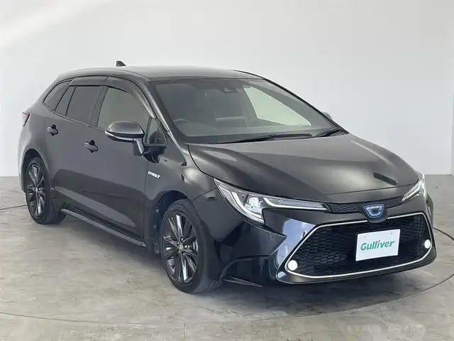 トヨタ カローラツーリング ハイブリッド ダブルバイビー 愛知県 2020(令2)年 4.7万km ブラックマイカ トヨタセーフティーセンス/・オートハイビーム/・レーダークルーズコントロール/・車線逸脱/・衝突軽減/・ブラインドスポットモニター/純正ディスプレイオーディオ/　・ナビ/　・Bluetooth/　・フルセグTV/バックカメラ/純正ドライブレコーダー/電動パーキングシステム/ステアリングリモコン/革巻きステアリング/ハーフレザーシート/ETC/純正アルミホイール/冬タイヤAWセット積み込み