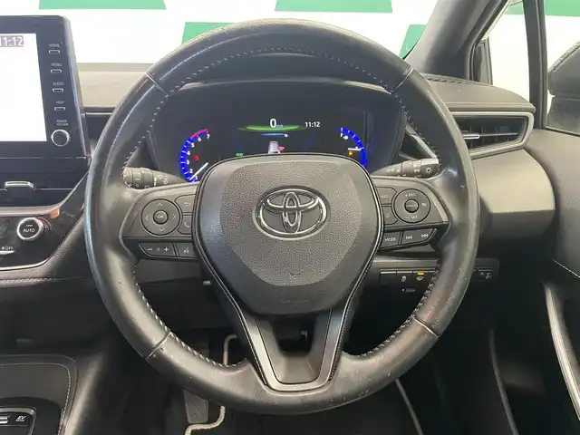 トヨタ カローラツーリング ハイブリッド ダブルバイビー 鹿児島県 2020(令2)年 4.7万km ブラックマイカ 禁煙車/トヨタセーフティセンス/　・レーントレーシングアシスト/　・レーンディバーチャーアラート/　・レーダークルーズコントロール/　・オートマチックハイビーム/ブラインドスポットモニター/純正ナビ機能付きディスプレイオーディオ/　・フルセグTV/　・USB接続/　・AppleCarPlay/　・AndroidAuto/　・MiraCast/　・AM/FM/電動パーキング/電動格納ミラー/オートライト/ETC/バックカメラ/ドライブレコーダー/ステアリングリモコン/冬用社外ホイールタイヤ積み込み