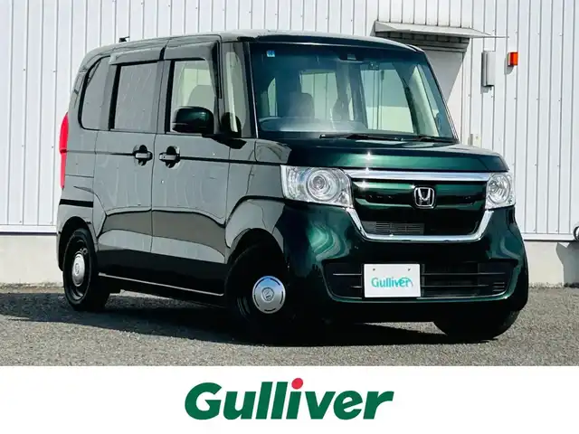 ホンダ Ｎ ＢＯＸ G L ホンダセンシング 熊本県 2019(令1)年 5万km ブリティッシュグリーンP 純正ナビ/・AM/FM/CD/DVD/BT/USB/・フルセグTV/バックカメラ/ホンダセンシング/・衝突軽減ブレーキ/・レーンキープアシスト/・先行車発進お知らせ/・標識検知機能/・オートハイビーム/・レーダークルーズコントロール/片側電動スライドドア/ドライブレコーダー/LEDヘッドライト/横滑り防止装置/ETC/前席シートヒーター/後席ロールサンシェード/電動格納ミラー/ウインカーミラー/ドアバイザー/純正フロアマット/純正アルミホイール