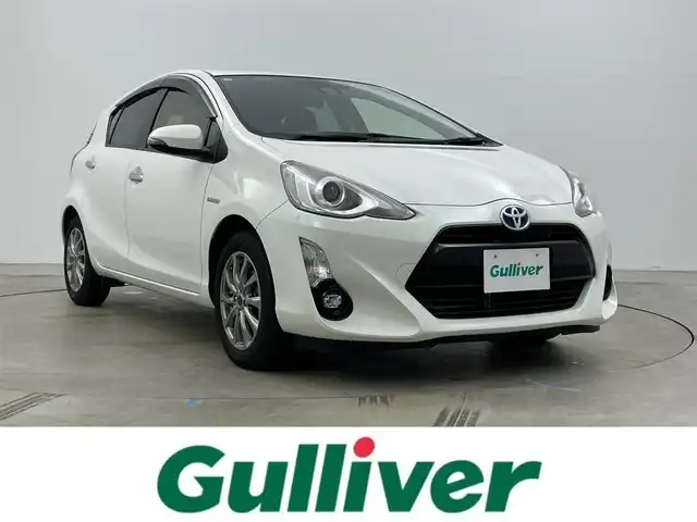 トヨタ アクア S スタイルブラック 岡山県 2016(平28)年 5.7万km ホワイトパールクリスタルシャイン 純正ナビ【NSZT-W66T】/・FM/AM/フルセグ/Bluetooth/CD/DVD/バックカメラ/ビルトインETC/トヨタセーフティセンス/・プリクラッシュセーフティ/・レーンキープアシスト/・オートマチックハイビーム/LEDヘッドライト/・フォグライト/純正フロアマット/社外アルミ/スマートキー/・プッシュスタート