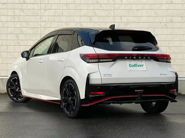 日産 オーラ ニスモ 岐阜県 2023(令5)年 1.6万km ピュアホワイトパール / スーパーブラック 2トーン ブラインドスポットモニター/置くだけ充電/純正SDナビ/-BT/USB/HDMI/プロパイロット/全周囲カメラ/リアフォグライト/電動パーキングブレーキ/ブレーキホールド/ドライブレコーダー/前後コーナーセンサー/オートマチックハイビーム/LEDヘッドライト/ステアリングスイッチ/ハーフレザーシート/ETC2.0/取扱説明書/保証書/スペアキー