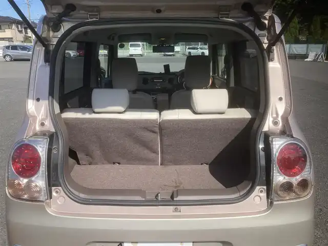 スズキ ラパン ショコラ X 埼玉県 2013(平25)年 9.4万km シャンパンピンクPM (株)IDOMが運営する【じしゃロン鳩ヶ谷店】の自社ローン専用車両になりますこちらは現金またはオートローンご利用時の価格です。自社ローンご希望の方は別途その旨お申付け下さい/登録時93242km/アイドリングストップ/プッシュスタート/CD再生機能付/AM/FM/AUX/ETC/オートライト/純正HIDヘッドライト/革巻きステアリング/革巻きシフトノブ/スマートキー/ダブルエアバッグ/盗難防止装置/デジタルインナーミラー/前方ドライブレコーダー/ベンチシート/ドアバイザー