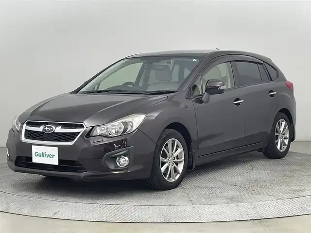 スバル インプレッサ スポーツ 2．0i アイサイト アイボリー 道央・札幌 2013(平25)年 4.3万km ディープチェリーパール ・４ＷＤ/・アイサイト/・社外ナビ/・バックカメラ/・Ｂｌｕｅｔｏｏｔｈ／ＣＤ／ＤＶＤ/・純正ドライブレコーダー/・アイドリングストップ/・アダプティブクルーズコントロール/・レーンキープアシスト/・オートマチックハイビーム/・オートエアコン/・ＥＴＣ/・プッシュスタート/・横滑り防止/・パワーステアリング/・パワーウィンドウ/・パワーシート/・HIDヘッドライト/・社外フロアマット/・純正アルミホイール
